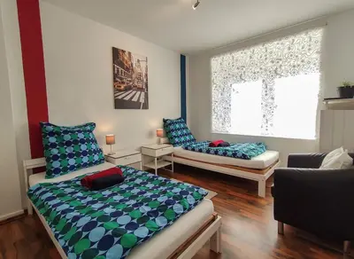 Ein Bett oder Betten in einem Zimmer der Unterkunft homes of ruhr - Monteurwohnung Schimanski