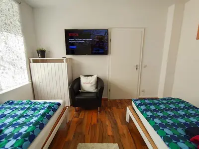 Ein Bett oder Betten in einem Zimmer der Unterkunft homes of ruhr - Monteurwohnung Schimanski