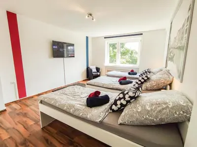 Ein Bett oder Betten in einem Zimmer der Unterkunft homes of ruhr- Monteurwohnung Pilsken