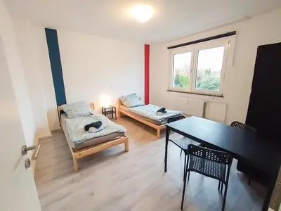 Ein Bett oder Betten in einem Zimmer der Unterkunft homes of ruhr - Monteurwohnung Werk II