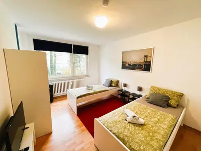 Ein Bett oder Betten in einem Zimmer der Unterkunft homes of ruhr - Monteurwohnung Förderturm