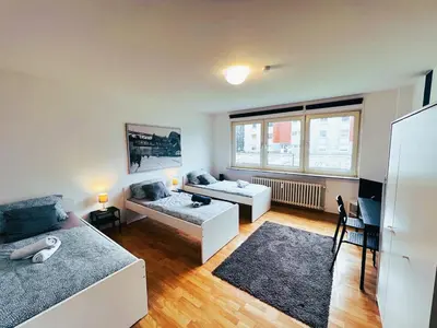Ein Bett oder Betten in einem Zimmer der Unterkunft homes of ruhr - Monteurwohnung Förderturm