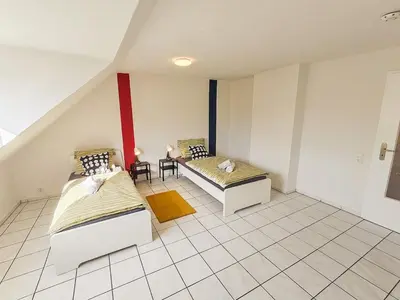 Ein Bett oder Betten in einem Zimmer der Unterkunft homes of ruhr- Monteurwohnung Kabuff