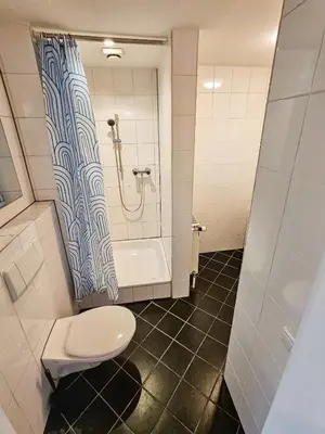 Ein Badezimmer in der Unterkunft homes of ruhr- Monteurwohnung Kabuff