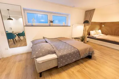Ein Bett oder Betten in einem Zimmer der Unterkunft City Nest Dortmund