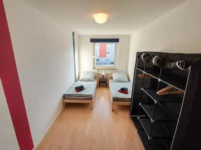 Ein Bett oder Betten in einem Zimmer der Unterkunft homes of ruhr - Monteurwohnung Pütt