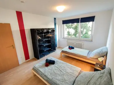 Ein Bett oder Betten in einem Zimmer der Unterkunft homes of ruhr - Monteurwohnung Pütt