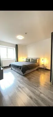Ein Bett oder Betten in einem Zimmer der Unterkunft Home Apartments two