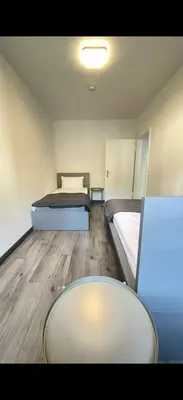 Ein Sitzbereich in der Unterkunft Home Apartments two