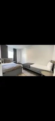 Ein Bett oder Betten in einem Zimmer der Unterkunft Home Apartments two