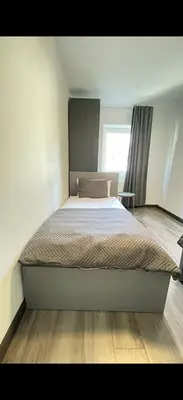 Ein Bett oder Betten in einem Zimmer der Unterkunft Home Apartments two
