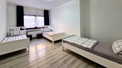 Ein Bett oder Betten in einem Zimmer der Unterkunft BS Oberhausen Comfort Zentral-Apartment