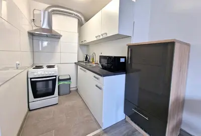 Küche/Küchenzeile in der Unterkunft BS Oberhausen Comfort Zentral-Apartment