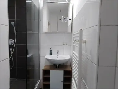Ein Badezimmer in der Unterkunft Haus Blankenagel 2
