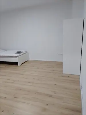 Ein Bett oder Betten in einem Zimmer der Unterkunft Haus Blankenagel 2
