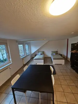 Ein Sitzbereich in der Unterkunft homes of ruhr - Monteurwohnung Malocher