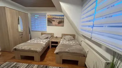 Ein Bett oder Betten in einem Zimmer der Unterkunft Mia Ein Zimmer für 2 Personen in eine WG
