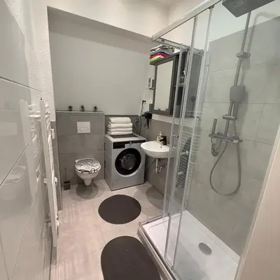 Ein Badezimmer in der Unterkunft Monteurwohnung oder Messewohnung inklusive Fitness Studio