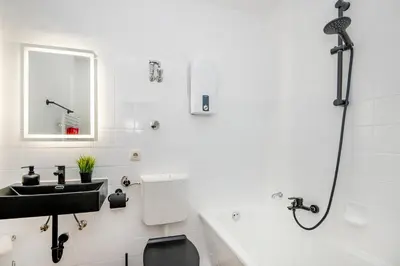 Ein Badezimmer in der Unterkunft Kurzzeitglück 24 h Self Check-In MH03