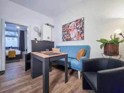 Ein Sitzbereich in der Unterkunft Alpha Apartments