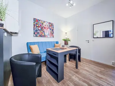 Ein Sitzbereich in der Unterkunft Alpha Apartments
