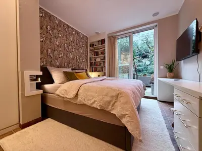 Ein Bett oder Betten in einem Zimmer der Unterkunft Briller Palais
