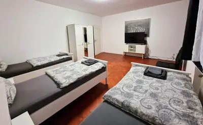 Ein Bett oder Betten in einem Zimmer der Unterkunft BS Comfort Oberhausen-Sterkrade City Apartment