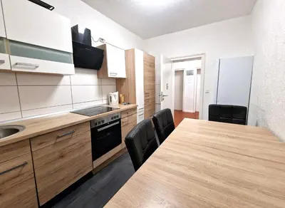 Küche/Küchenzeile in der Unterkunft BS Comfort Oberhausen-Sterkrade City Apartment