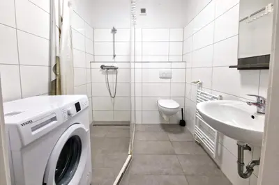 Ein Badezimmer in der Unterkunft BS Comfort Oberhausen-Sterkrade City Apartment