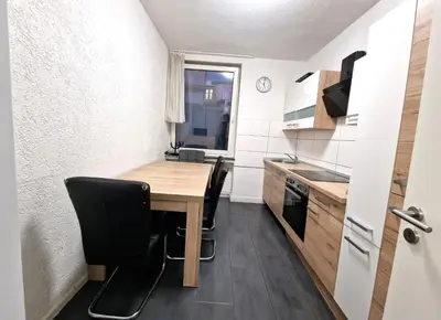 Küche/Küchenzeile in der Unterkunft BS Comfort Oberhausen-Sterkrade City Apartment