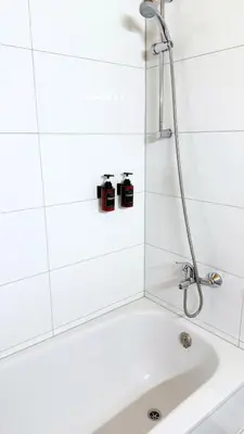 Ein Badezimmer in der Unterkunft Moderne Wohnung mit Arbeitsplatz, Netflix, Nespresso & privatem Stellplatz