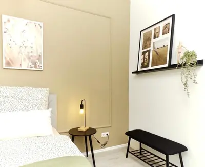 Ein Bett oder Betten in einem Zimmer der Unterkunft Moderne Wohnung mit Balkon ideal für Familien und Geschäftsreisende