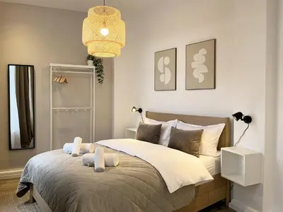 Ein Bett oder Betten in einem Zimmer der Unterkunft Domblick 1 I Zentral I Parkplatz I Nähe Veltins-Arena