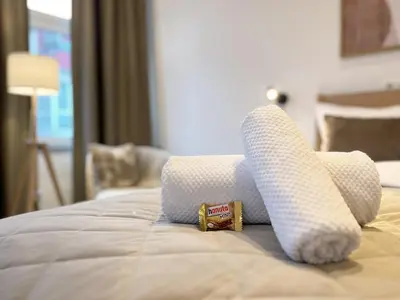 Ein Bett oder Betten in einem Zimmer der Unterkunft Domblick 1 I Zentral I Parkplatz I Nähe Veltins-Arena
