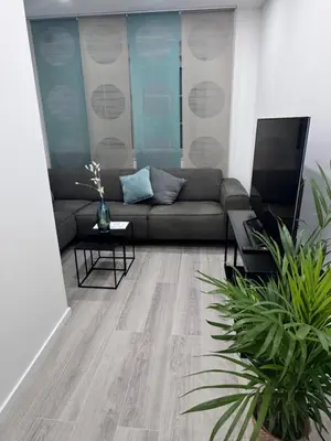 Ein Sitzbereich in der Unterkunft Modernes Haus mit Garten & Privatparkplatz Villa