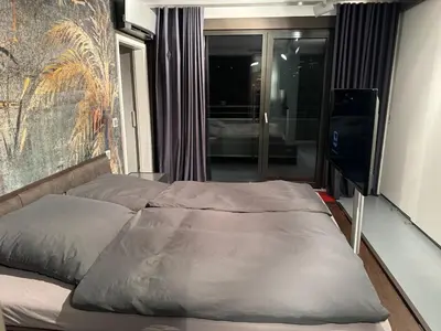 Ein Bett oder Betten in einem Zimmer der Unterkunft 4 Zimmer Luxus Apartment mit Sauna und Heimkino