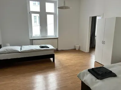 Ein Bett oder Betten in einem Zimmer der Unterkunft FirmenQuartier24 im 2 OG in Wuppertal
