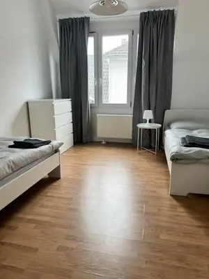 Ein Bett oder Betten in einem Zimmer der Unterkunft FirmenQuartier24 im DG in Wuppertal