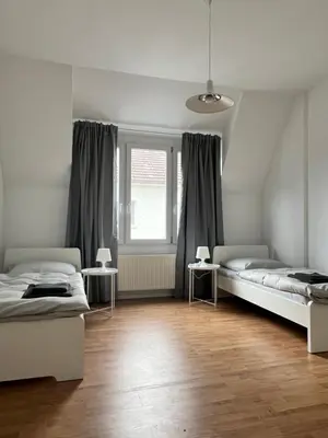 Ein Bett oder Betten in einem Zimmer der Unterkunft FirmenQuartier24 im DG in Wuppertal