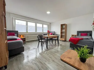 Ein Bett oder Betten in einem Zimmer der Unterkunft Serviceroom24 - Apartment 1 in Gladbeck WLAN - Smart-TV - 24-7 Check-in und Küche