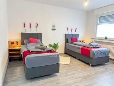 Ein Bett oder Betten in einem Zimmer der Unterkunft Serviceroom24 - Apartment 1 in Gladbeck WLAN - Smart-TV - 24-7 Check-in und Küche