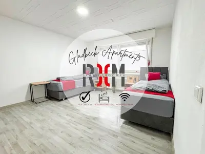Ein Bett oder Betten in einem Zimmer der Unterkunft Serviceroom24 - Apartment 3 in Gladbeck WLAN - Smart-TV - 24-7 Check-in und Küche