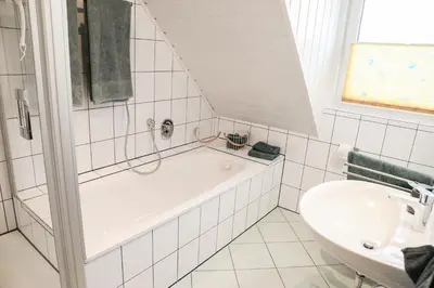 Ein Badezimmer in der Unterkunft Ferienwohnung Rhader Wiesen