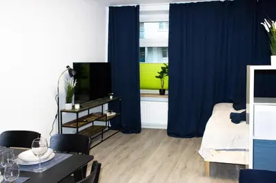 TV/Unterhaltungsangebot in der Unterkunft Modernes Apartment Zentral mit Küche & Smart TV