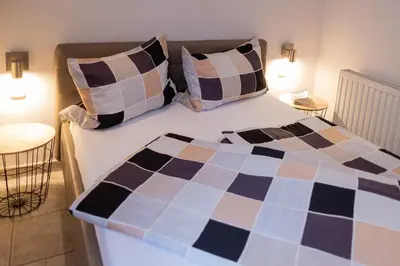 Ein Bett oder Betten in einem Zimmer der Unterkunft FeWo Severin