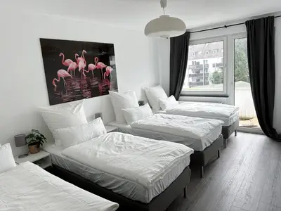 Ein Bett oder Betten in einem Zimmer der Unterkunft Beautiful flat with living room and kitchen sleeps 4p on separate beds and 2p on sofa
