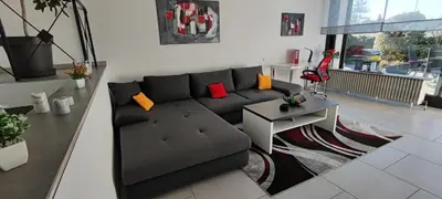 Ein Sitzbereich in der Unterkunft Moderne Doppelhaushälfte mit Süd-West-Terrasse