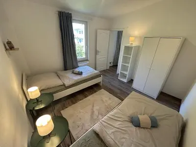 Ein Bett oder Betten in einem Zimmer der Unterkunft Enchanting House in Wuppertal