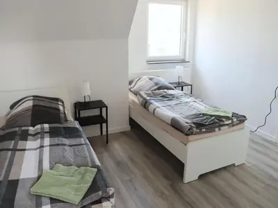Ein Bett oder Betten in einem Zimmer der Unterkunft Relax & Stay in Wuppertal