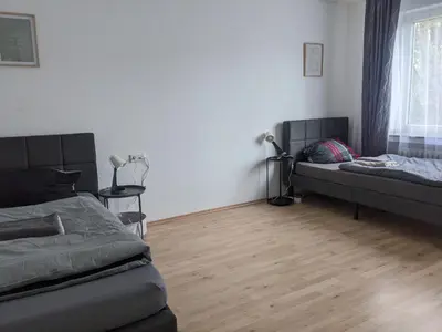 Ein Bett oder Betten in einem Zimmer der Unterkunft Monteurwohnung 1 Ferienwohnung Business Appartement Velbert 6 Personen